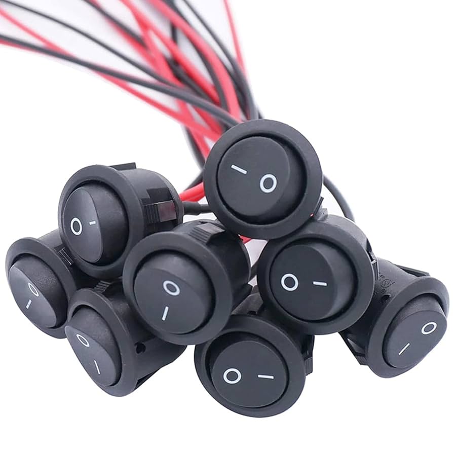 Switch para carro de botón redondo negro 2 ESPIGAS CONINCA - Ferretería y Distribuidora el 