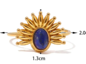 Anillo dorado con púas y perla azul - Baleni