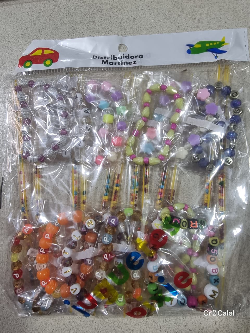 PULSERAS CON INICIALES CON  DULCE - VARIEDADES EL TRIUNFO