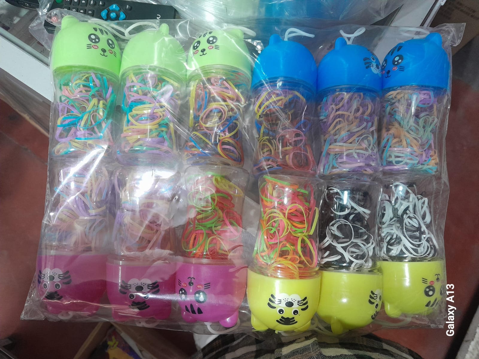 PAQUETE DE HULE EN FRASCO DISEÑO GATITO - VARIEDADES EL TRIUNFO